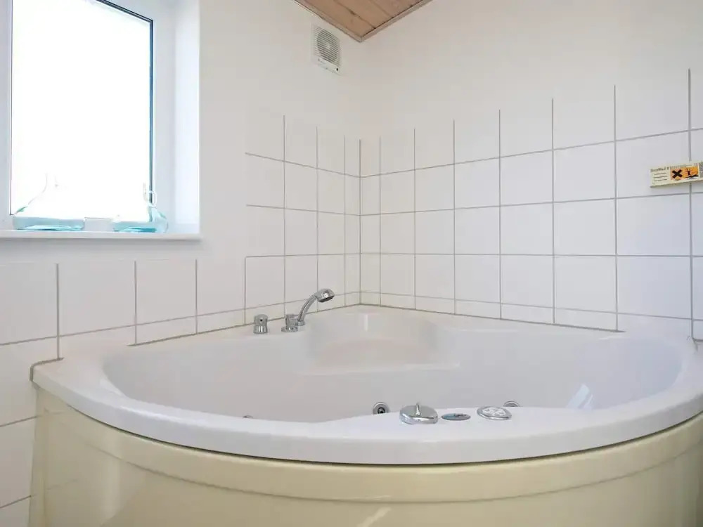 8 person holiday home on a holiday park in Løkken
