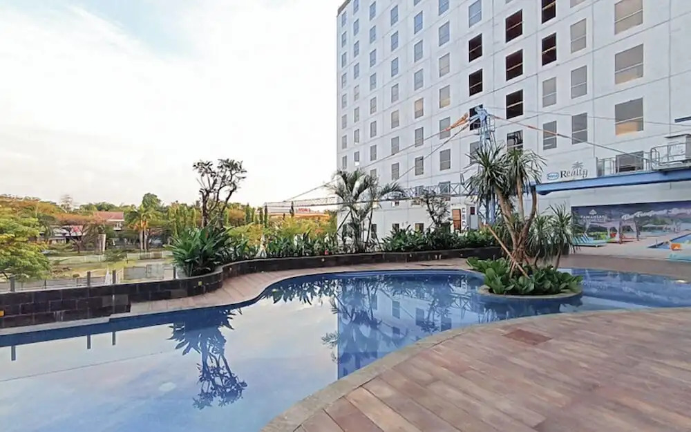Grey Toned 1Br Apartment Tamansari Skylounge Makassar