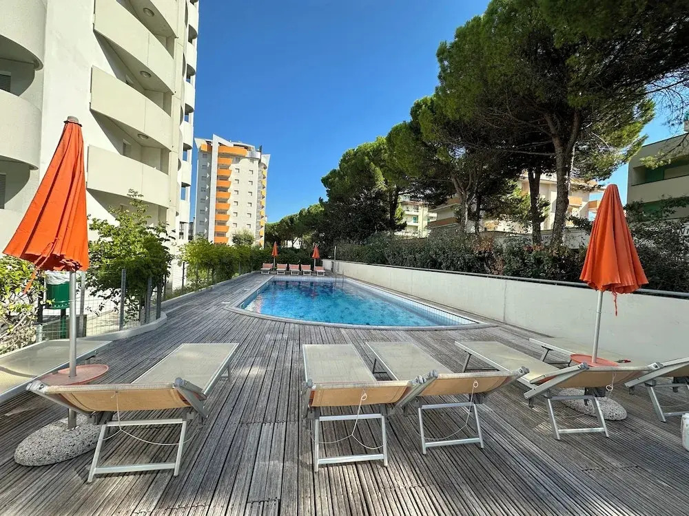 Apartment With Pool Near the Beach