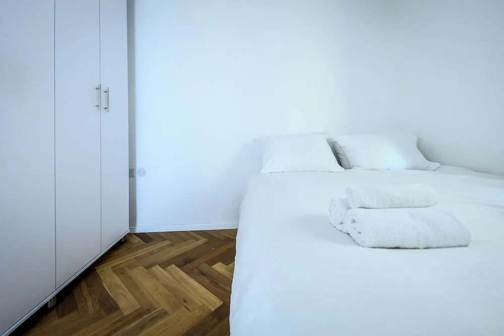 Stylish 3BR Apt with Patio in the City