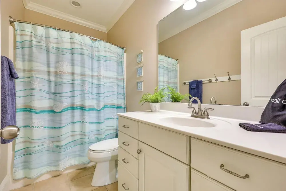 Walk to Beach: Oak Island Retreat w/ 210-yard Dock