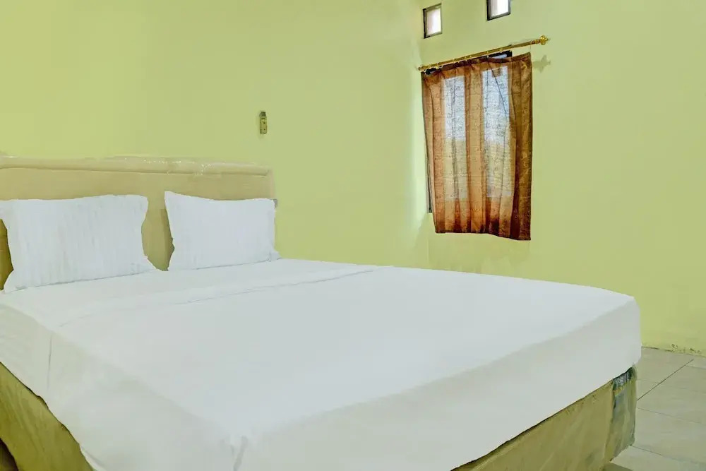 Capital O 92316 Wisma Widya Loka Pratama Near Futsal Tebing Gading