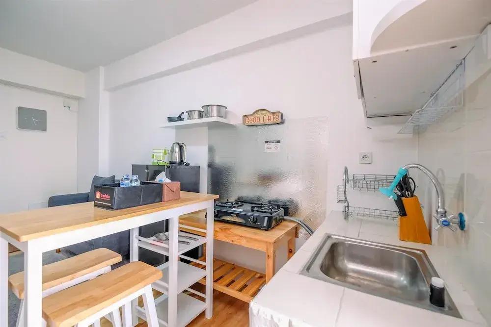 Homey and Simply 2BR Apartment at Cinere Resort By Travelio