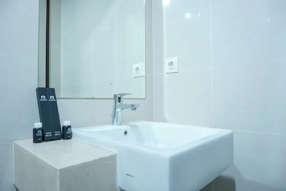 Strategic Location 1BR Apartment @ Puri Mansion near Puri By Travelio
