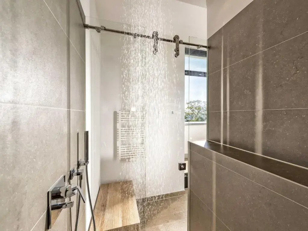 Villa Philine - Penthouse 28 mit Panoramablick, Pool, SPA & Kamin