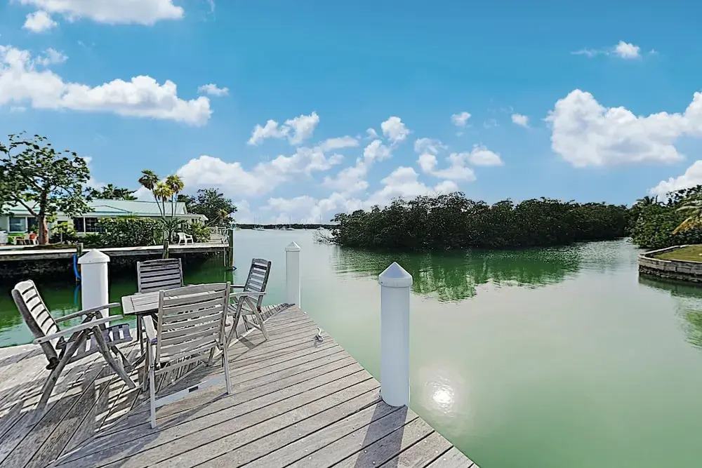 Sun-soaked Canal-front W/ Private Dock & Pool 3 Bedroom Home