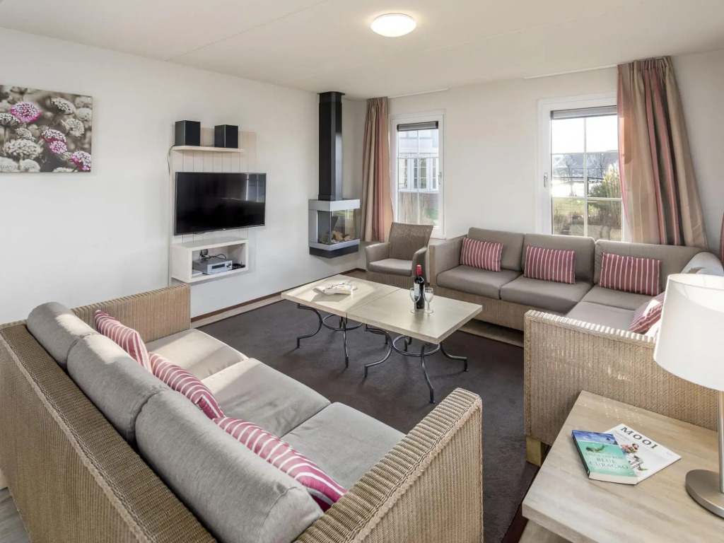 Restyled villa with sauna and rowing boat, in a holiday park, 400 m from the sea
