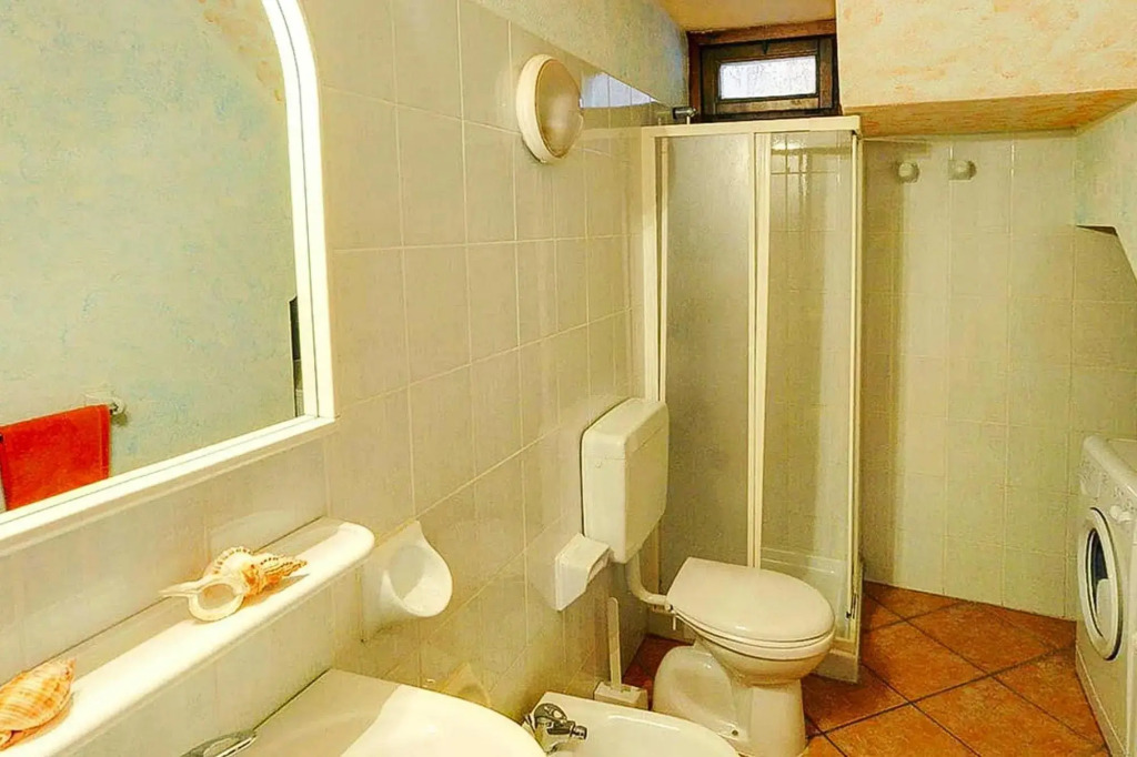 Apartment in Cannegione with communal terrace