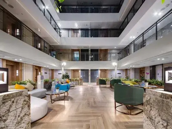 Xingfu Holiday Hotel (Buji Shenzhen East Railway Station Branch)