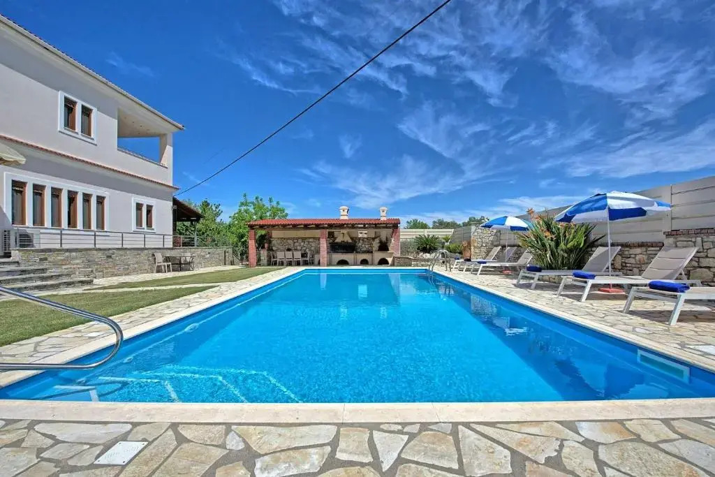 Acharavi Beach Villa by PosarelliVillas