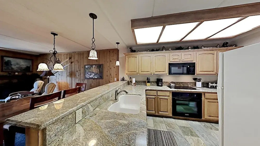 2 Bedroom Condo Just Steps Away From Summer Recreational Activities by RedAwning