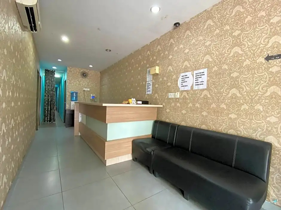 OYO 89760 Harmoni Inn Hotel