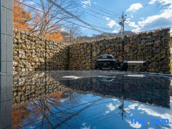 River view house with BBQ & private sauna, wood stove — designer villa with stone terrace & fire