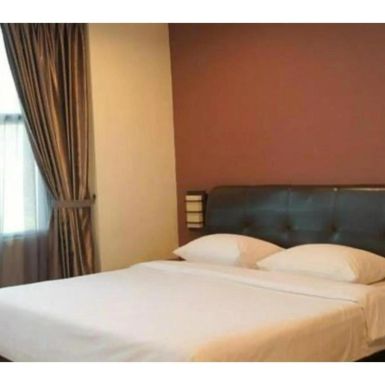 Capital O Rail Hotel
