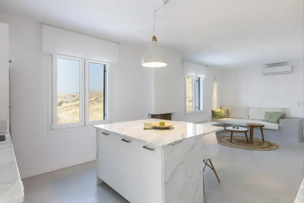 Modern home with 2 apartments, a swimming pool and sea view, in the area of Koundouros