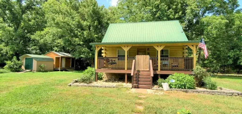 Yellow Cabin on the River