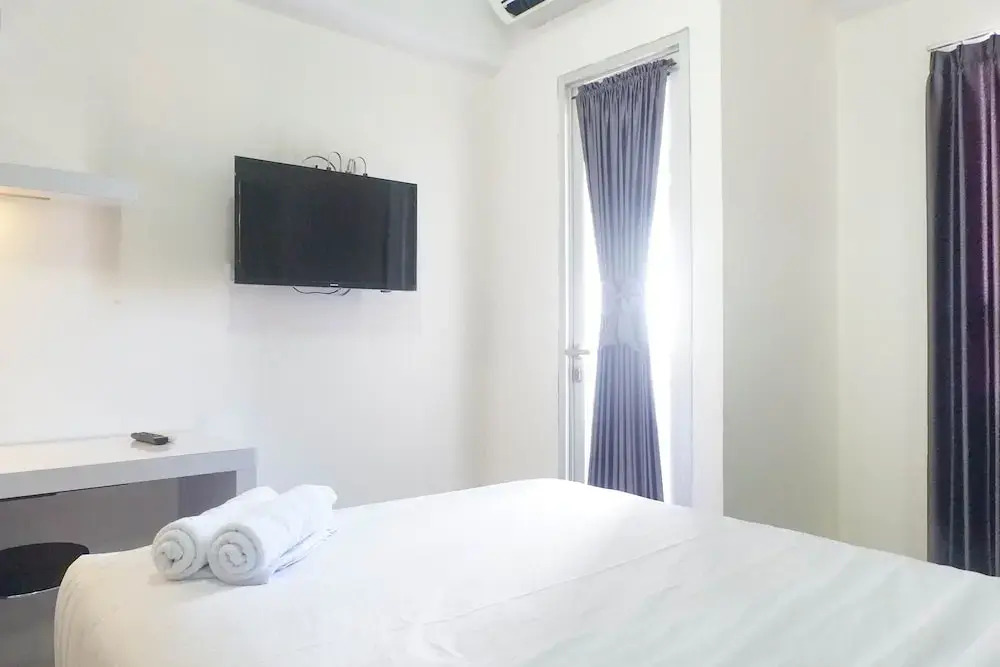 Cozy Living Studio Apartment at Puri Mas
