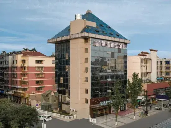 Qingmu Platinum Hotel (Changxing East fish square eight hundred companion store)