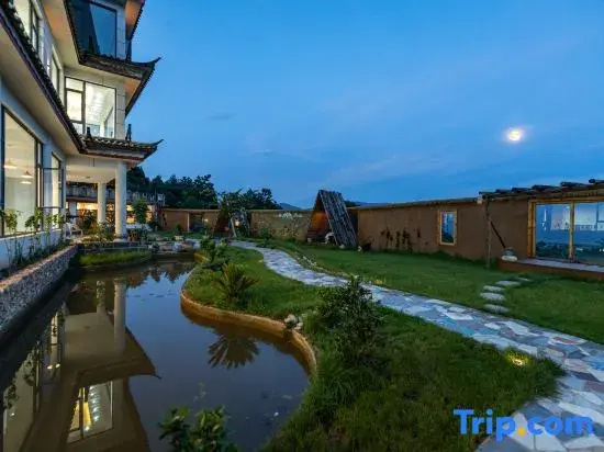 Listening to the wind · Courtyard Green Forest Rizhao Jinshan View Inn (Yulong Snow Mountain)
