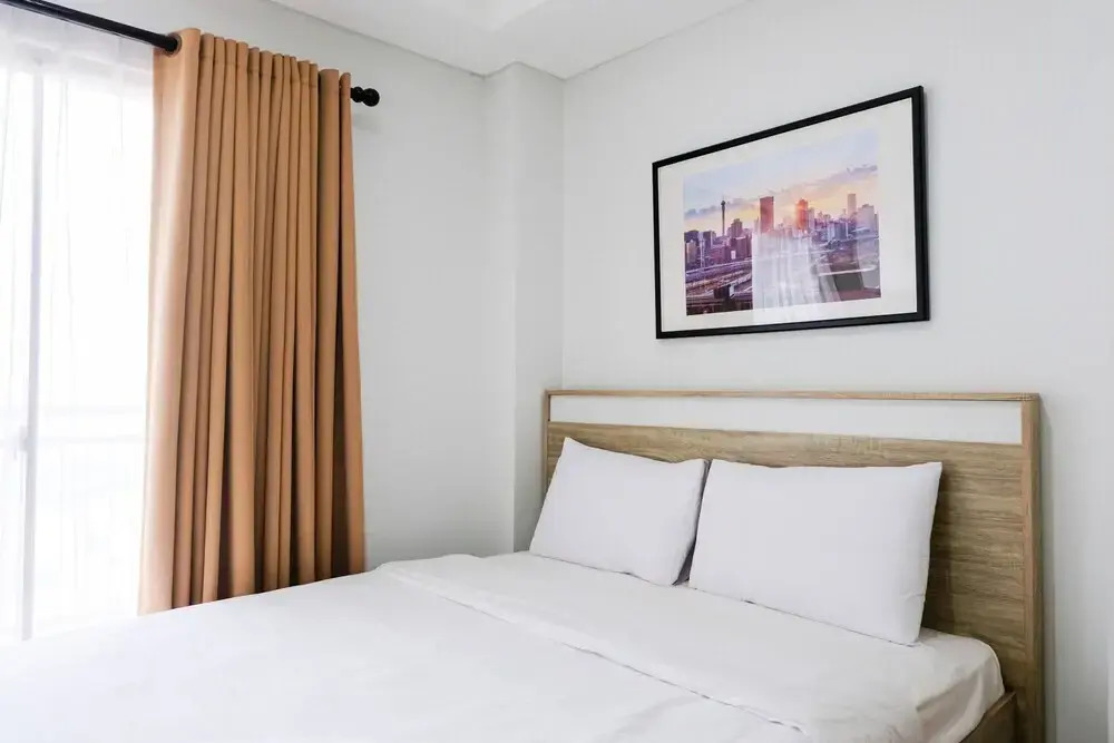 Cozy Studio Apartment with Smart TV at Springwood Residence