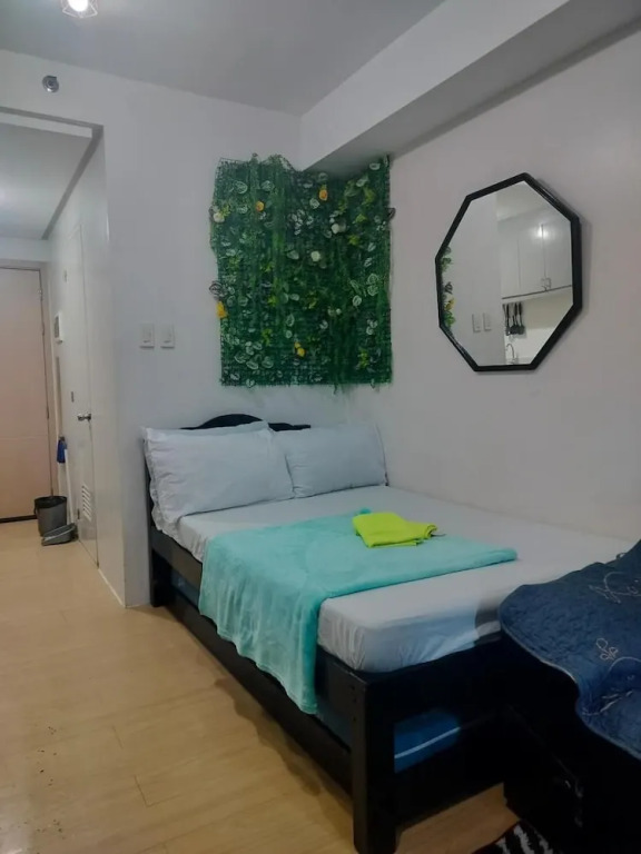 Cozy City View Condo in Quezon City - Your Home Away From Home