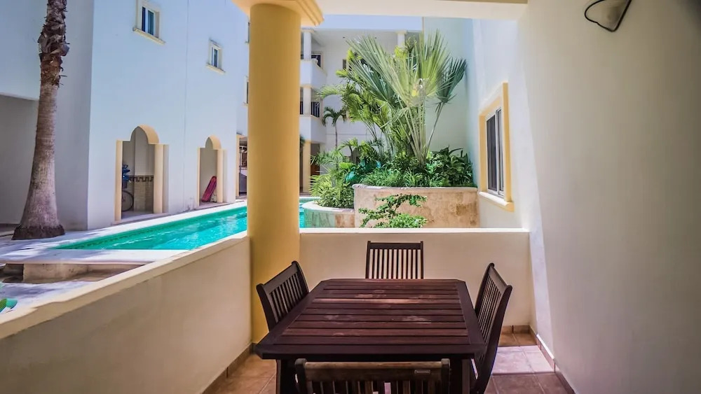 Romanina 1 Condo in the Heart of Playa del Carmen by RedAwning