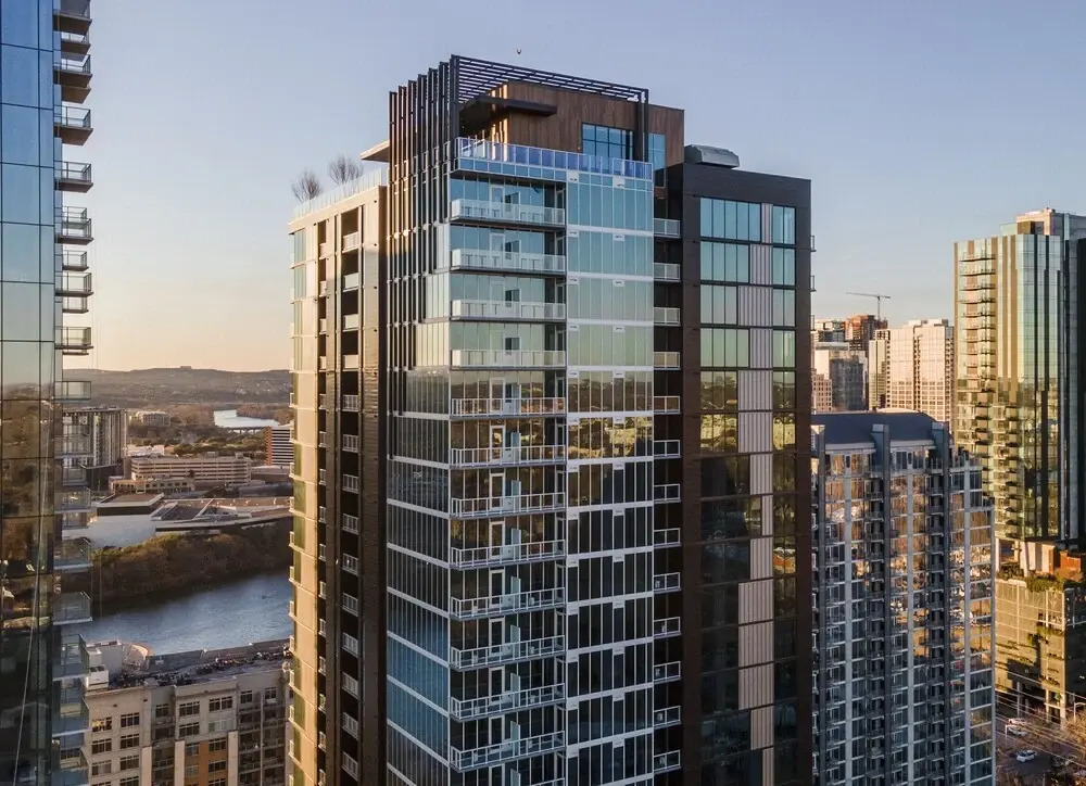 20th floor condo with pool on Rainey St by Locale