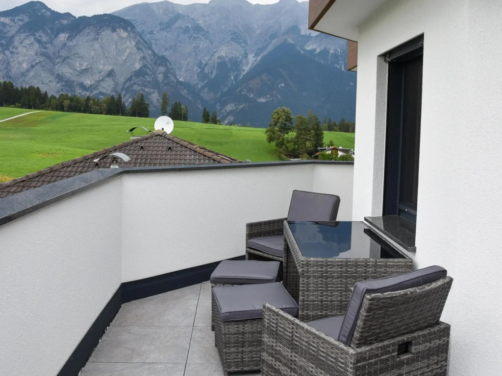 Apartment in Götzens with roof terrace and e-car charging station