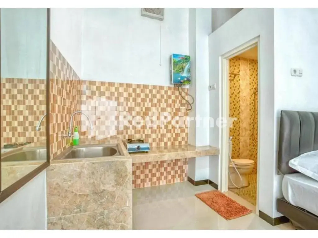 Griya Rahayu Guesthouse Mitra RedDoorz Near Jatim Park 2 Batu(Griya Rahayu Guesthouse RedPartner near Jatim Park 2 Batu)