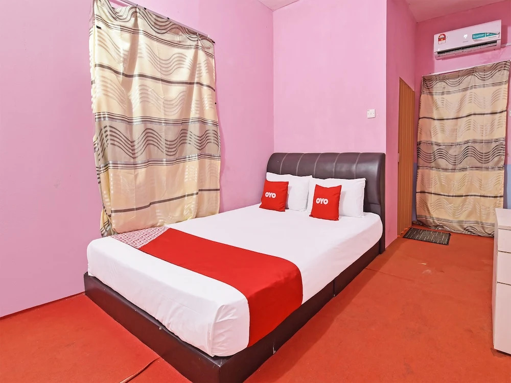 OYO 90664 Rabi Hotel