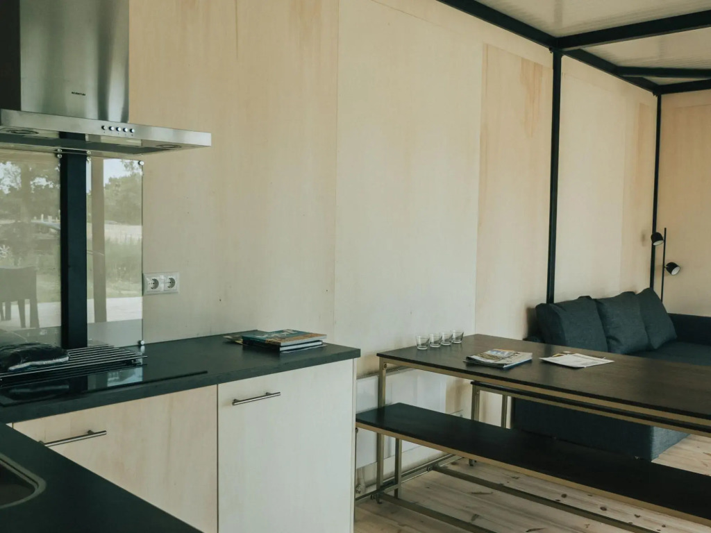 Modern chalet with terrace, located in a holiday park 800 m. from the beach
