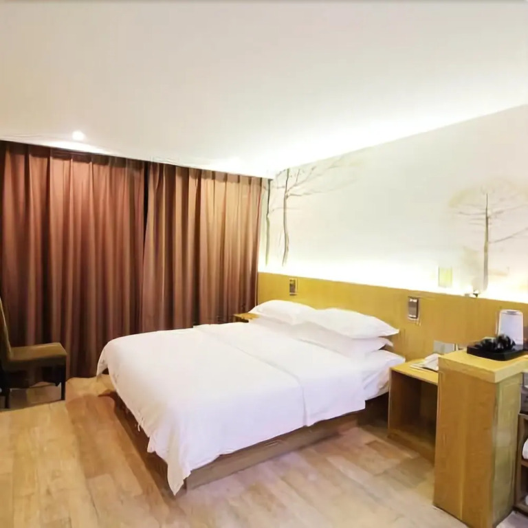Junpin Coastal Hotel (Qingdao Railway Station Subway Station Zhanqiao Branch)(君品海岸酒店（青岛火车站地铁站栈桥店）)