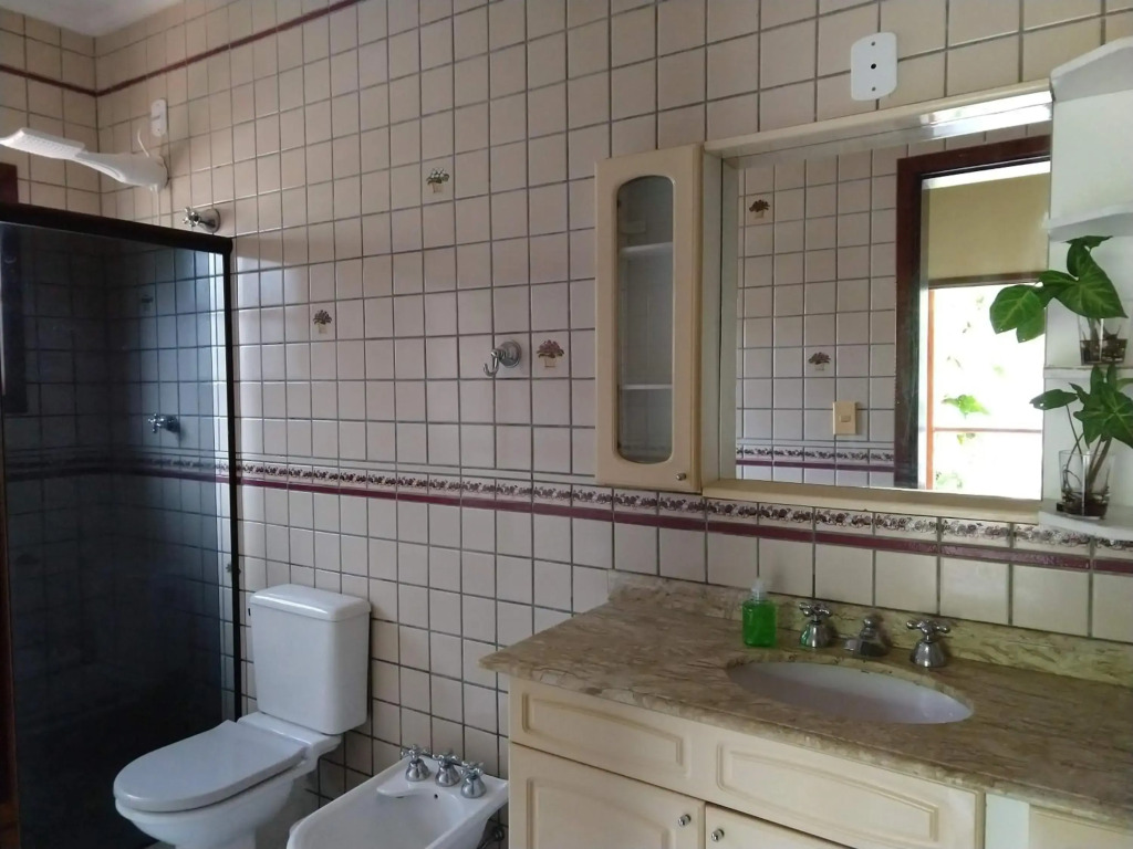 Casa 5 suítes com piscina e churrasqueira