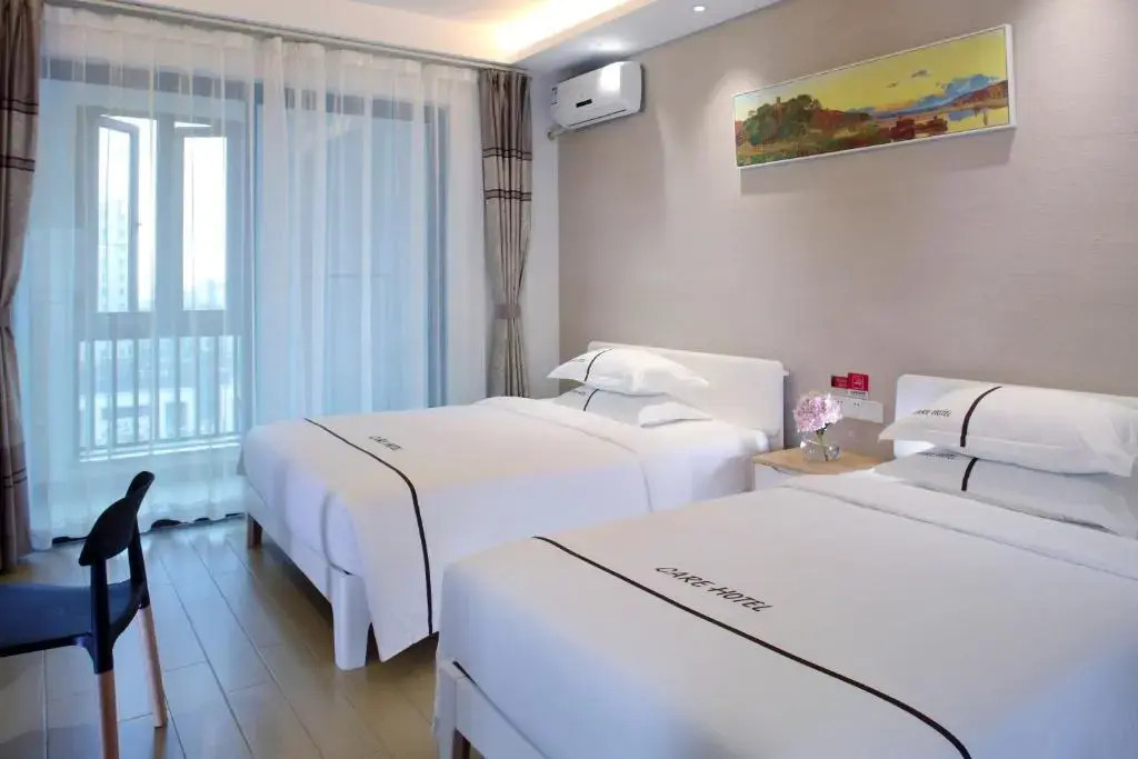 Green Collection Care Hotel (24 Hours Free Transfer from Meilan Airport/Railway Station)