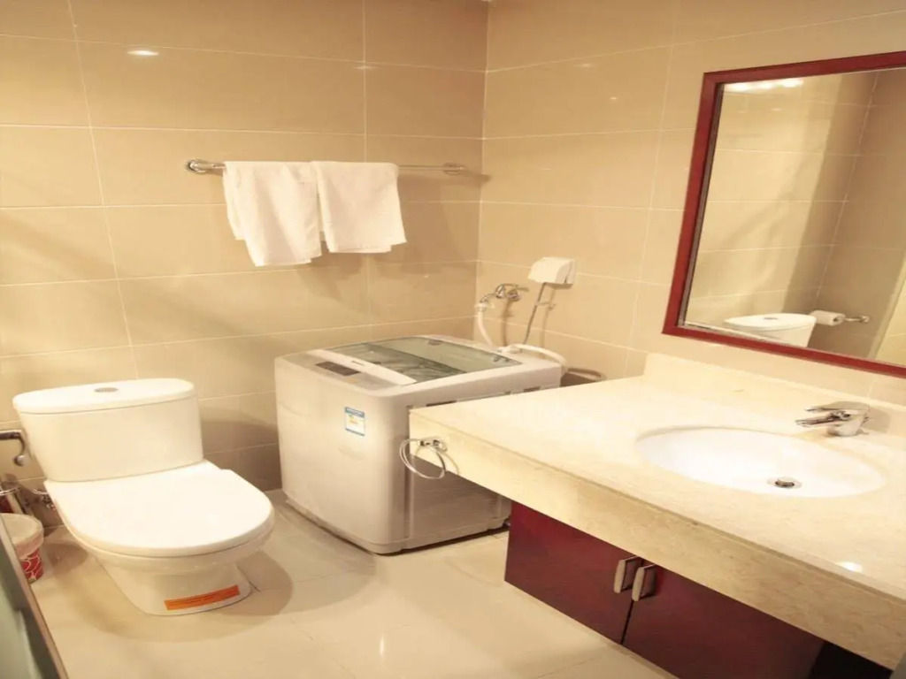Dalian Jiuxing Apartment