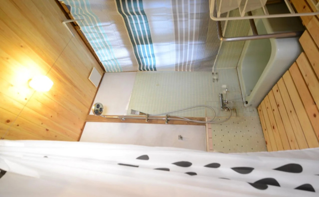 Taketa station hostel cue