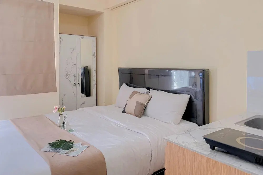 Good Choice Studio at Green Pramuka Apartment near Shopping Center By Travelio