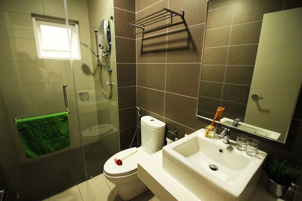 Sentrio Suites @ City Center by HnHCozy