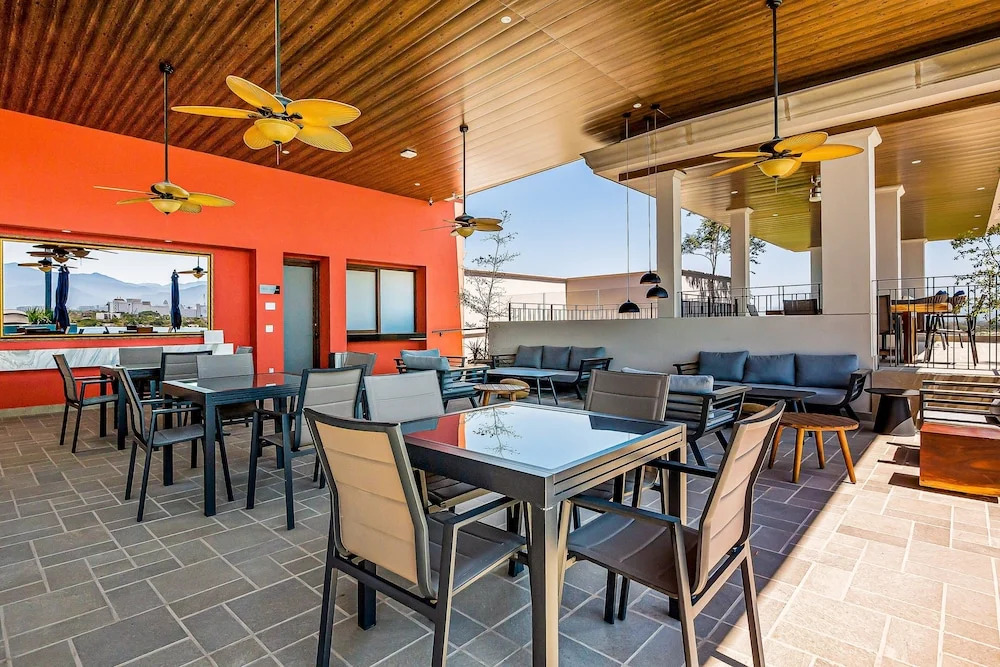 Mountain-view Apartment Near Beach With Balcony, Rooftop Pool, Gym, & Ping-pong