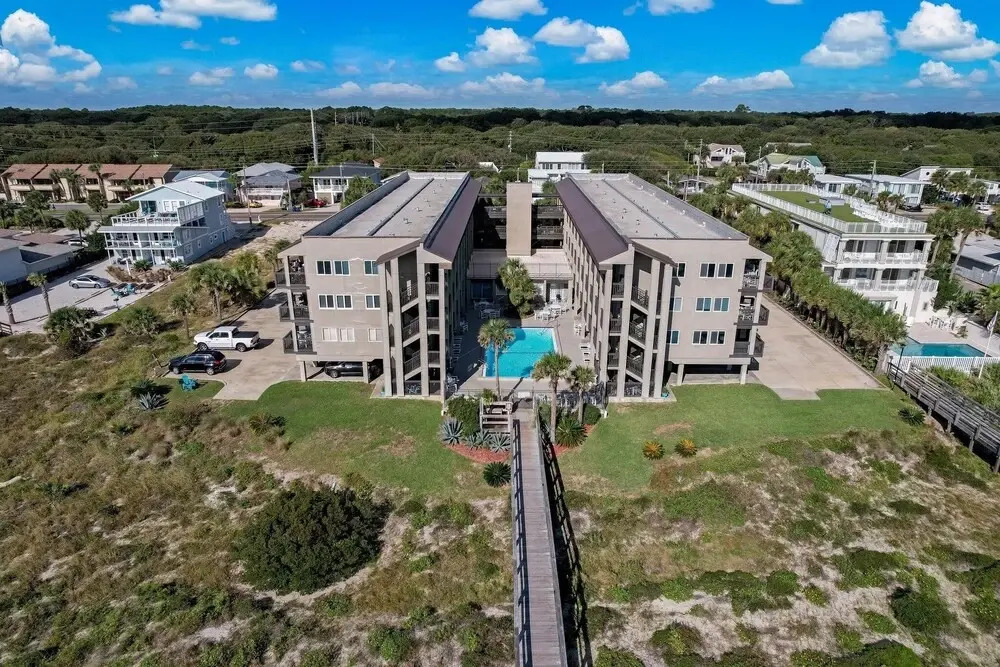 Newly Remodeled Oceanfront Condo with Salt Water Pool and Private Walkway to Beach by RedAwning