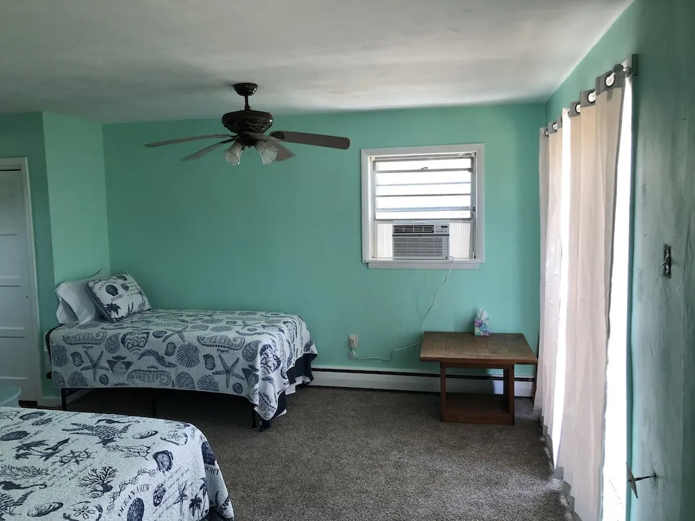 Beach Front On The Bay In Our Rustic, Pet Friendly Cottage 4 Bedroom Cottage by RedAwning
