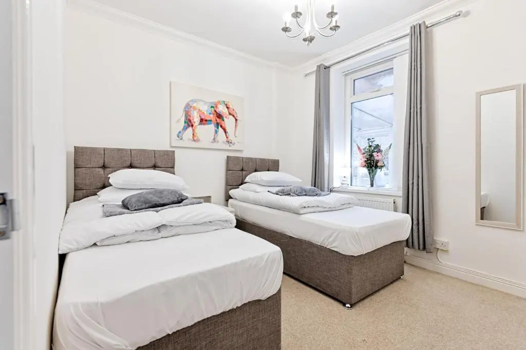 Spacious home with parking - TV in Every Bedroom!