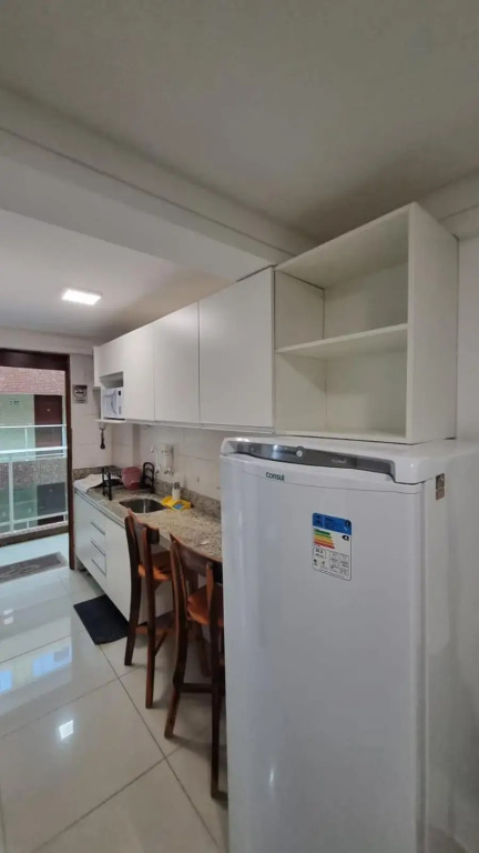 Confortável Flat com piscina de borda infinita na cobertura