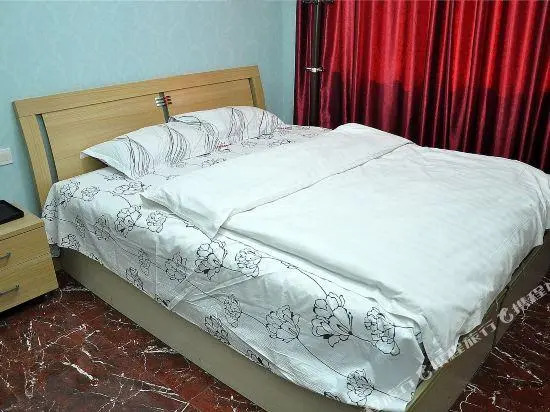 Yinan Shangjia Express Business Hotel
