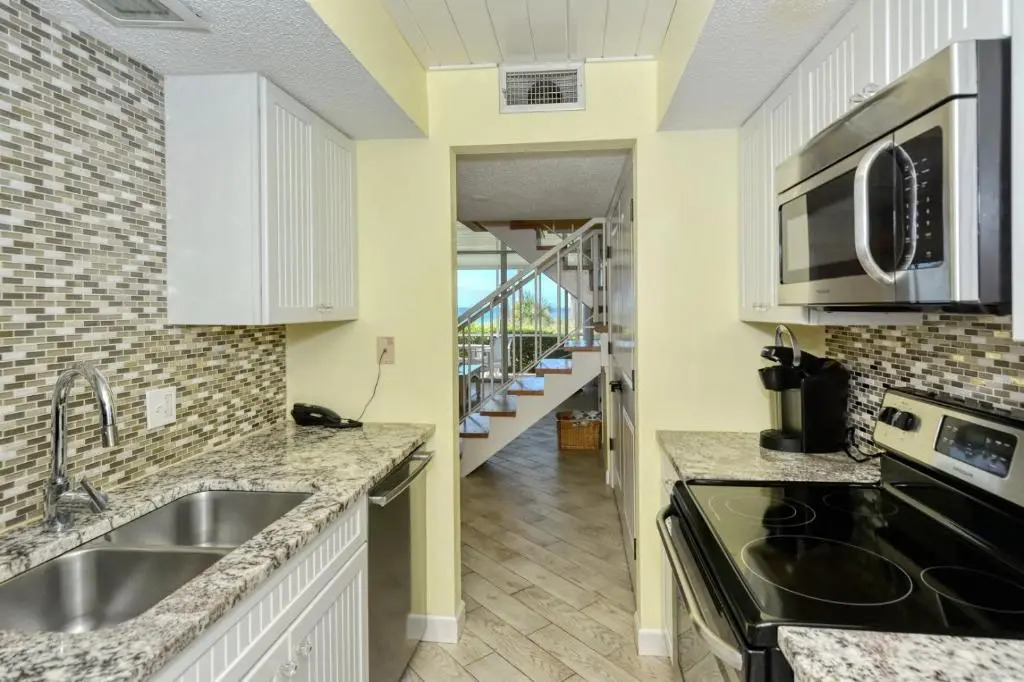 LaPlaya 105B-Relax on the balcony and watch the dolphins swim by and the pelicans dive!