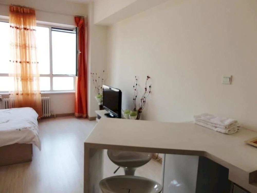 Chengshi Gongyuan Apartment - Dalian