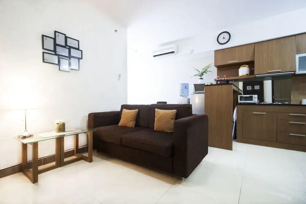 2BR Cozy at Empyreal Epicentrum Apartment By Travelio