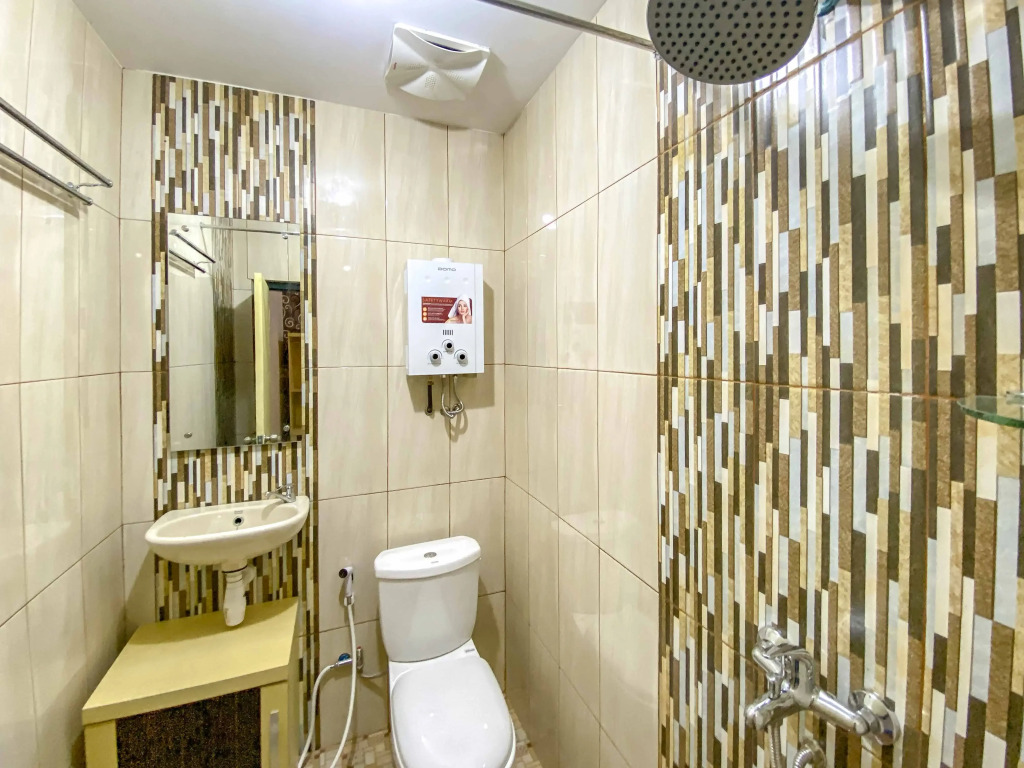 Tinis Guest House Malang Mitra RedDoorz