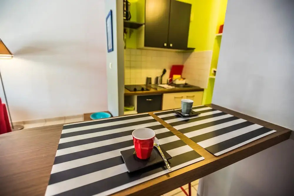 Appartement Kaza Logos