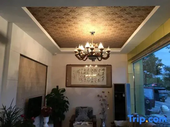 Jixi New Century Holiday Hotel